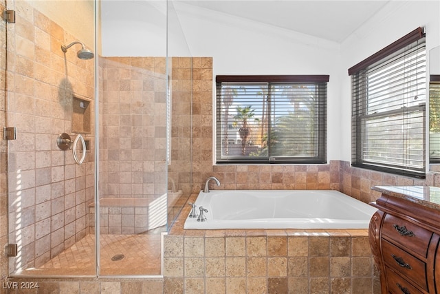 bathroom with vanity, separate shower and tub, crown molding, and vaulted ceiling