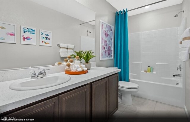 full bathroom featuring vanity, toilet, and shower / tub combo with curtain