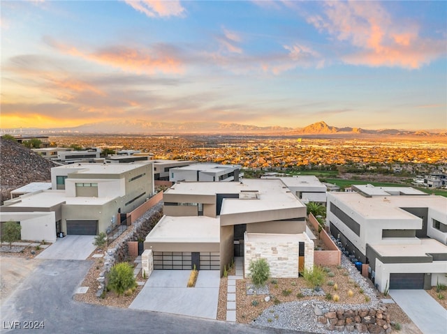 aerial view at dusk with a mountain view