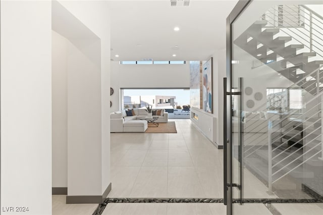 hall featuring tile patterned floors