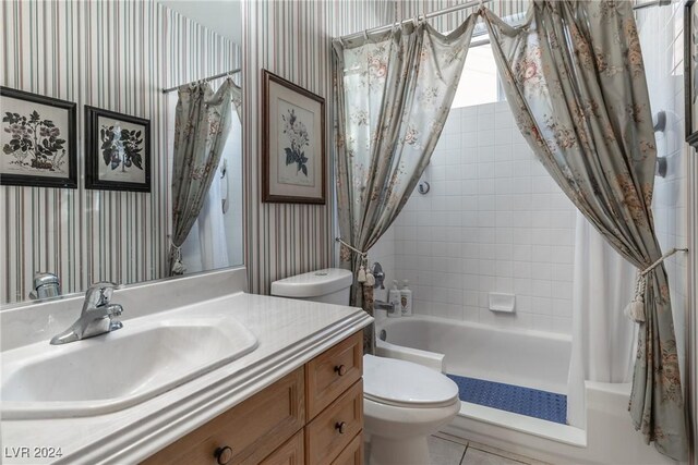 full bathroom with tile patterned flooring, vanity, toilet, and shower / bathtub combination with curtain