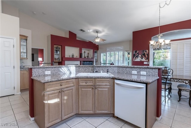 kitchen with dishwasher, lofted ceiling, an island with sink, and ceiling fan with notable chandelier