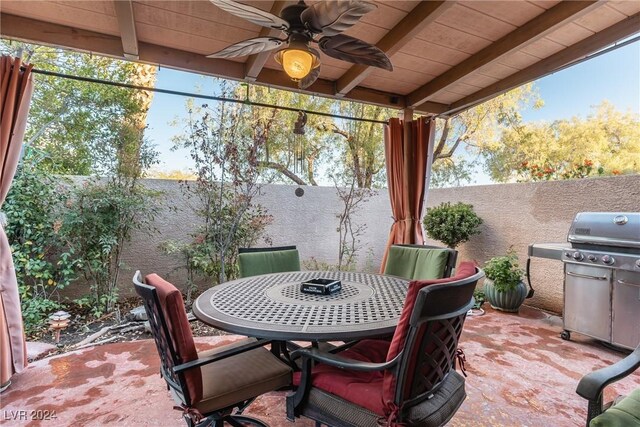 view of patio / terrace with area for grilling and ceiling fan