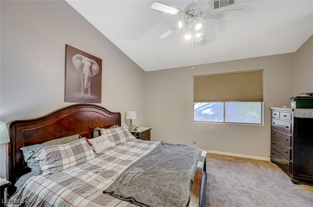 carpeted bedroom with ceiling fan and lofted ceiling