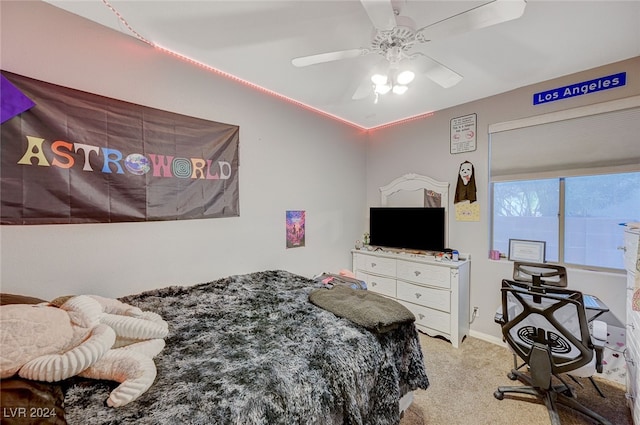 bedroom featuring ceiling fan and light colored carpet