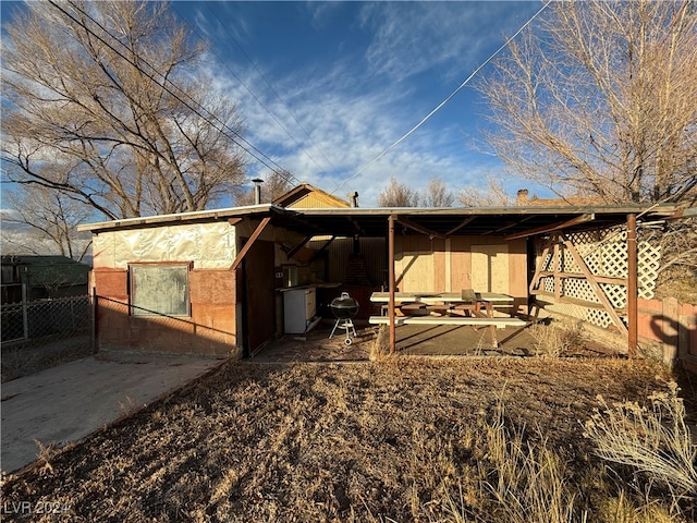 rear view of house with a patio area