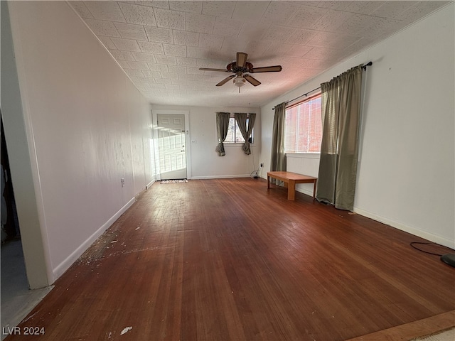 unfurnished room featuring hardwood / wood-style flooring and ceiling fan