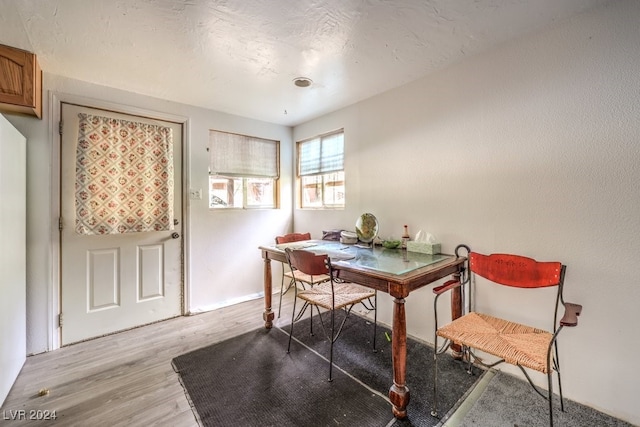 dining area featuring light wood-type flooring