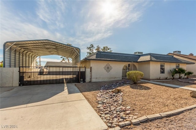 view of front of house with a carport