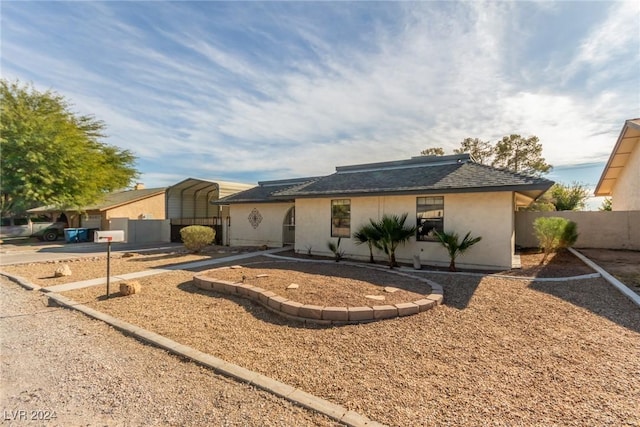 view of front of house featuring a carport