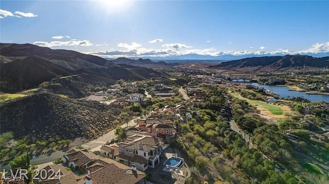 view of mountain feature with a water view