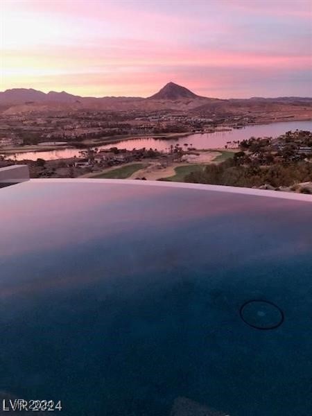 property view of mountains featuring a water view