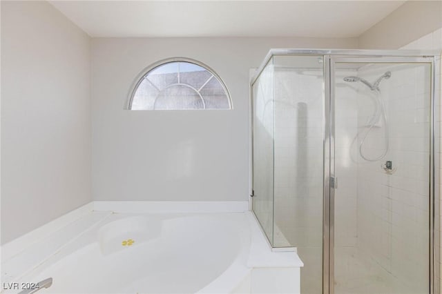 bathroom with independent shower and bath