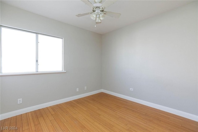 unfurnished room with light hardwood / wood-style floors and ceiling fan