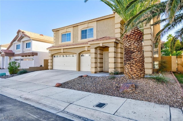 view of front of property with a garage