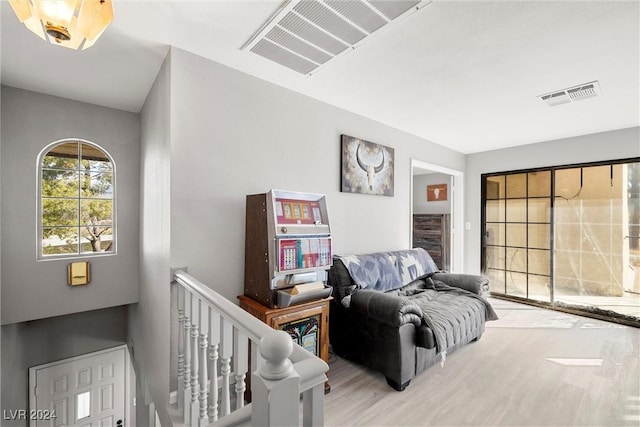 bedroom with wood finished floors and visible vents