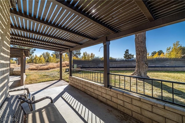 view of patio / terrace featuring fence and a pergola