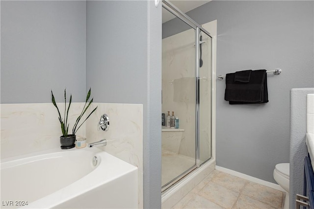 bathroom featuring toilet, a stall shower, tile patterned flooring, and a bath