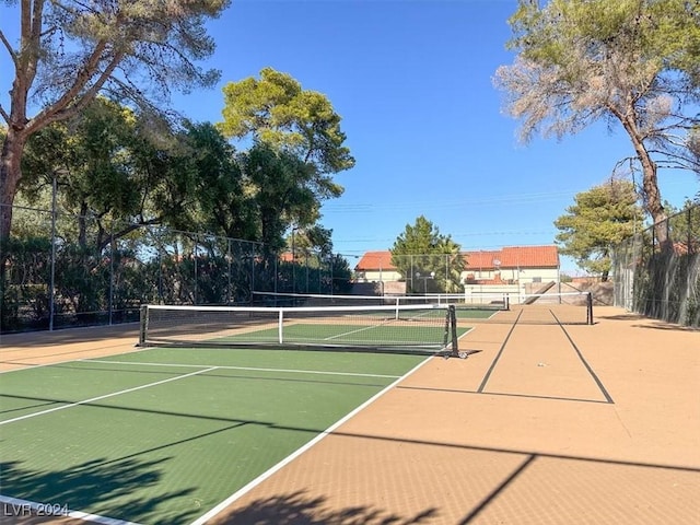 view of sport court with community basketball court and fence