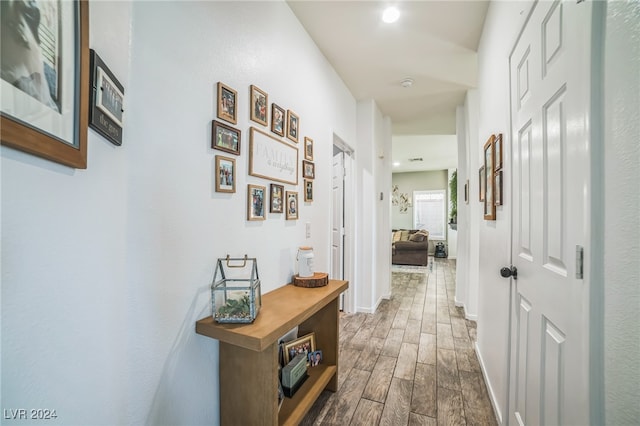 hall with dark hardwood / wood-style floors