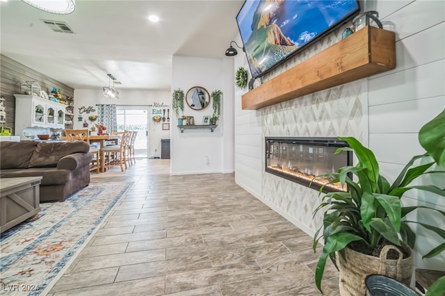 living room with light hardwood / wood-style flooring