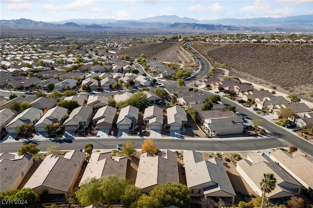 bird's eye view with a mountain view