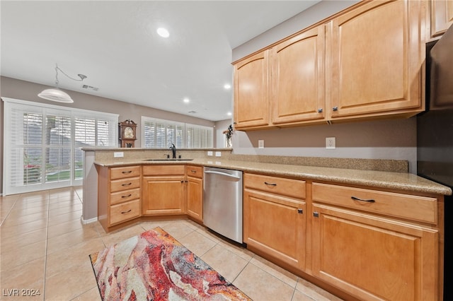 kitchen featuring kitchen peninsula, light brown cabinetry, stainless steel dishwasher, sink, and light tile patterned flooring