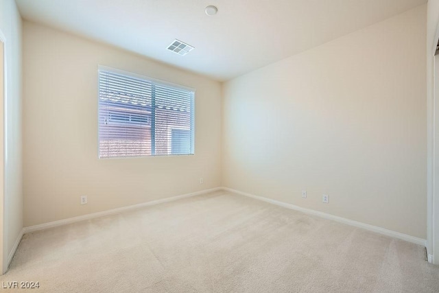 62 Augusta Course Ave, Las Vegas, NV 89148 - spare room with light colored carpet and baseboards