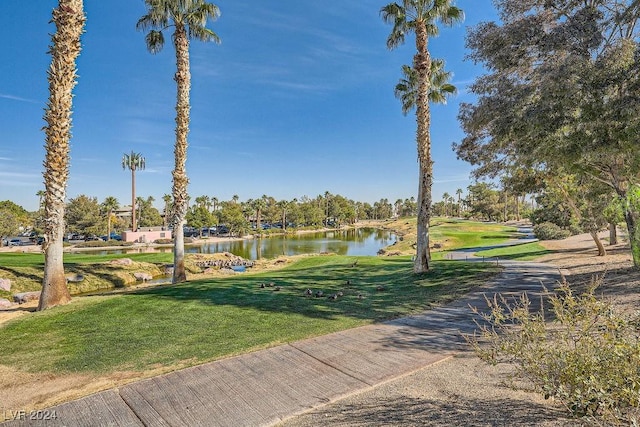 62 Augusta Course Ave, Las Vegas, NV 89148 - view of home's community featuring a water view and a lawn