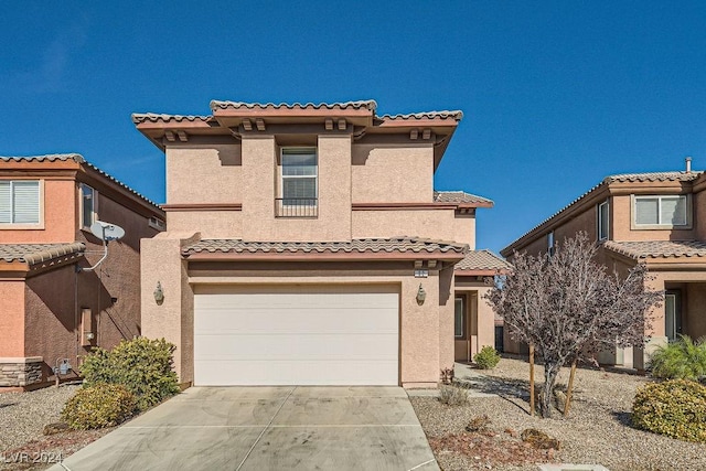 62 Augusta Course Ave, Las Vegas, NV 89148 - view of front of property featuring stucco siding, driveway, an attached garage, and a tiled roof