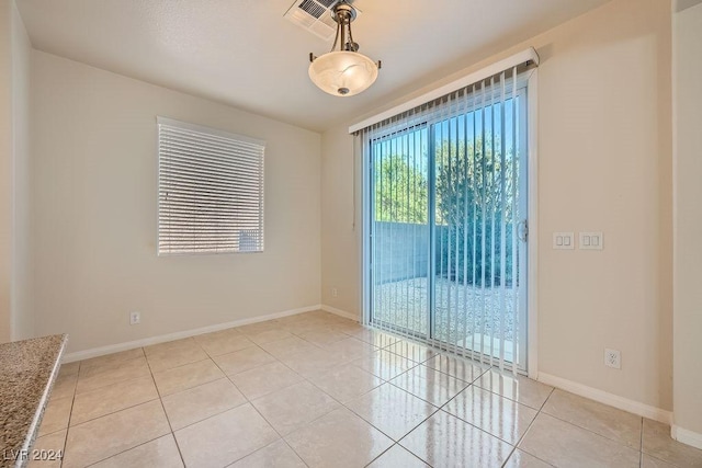 62 Augusta Course Ave, Las Vegas, NV 89148 - unfurnished room with light tile patterned floors and baseboards