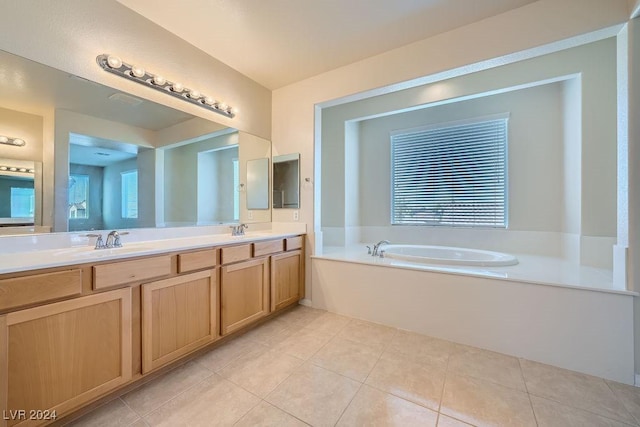 62 Augusta Course Ave, Las Vegas, NV 89148 - bathroom with a garden tub, double vanity, and tile patterned floors