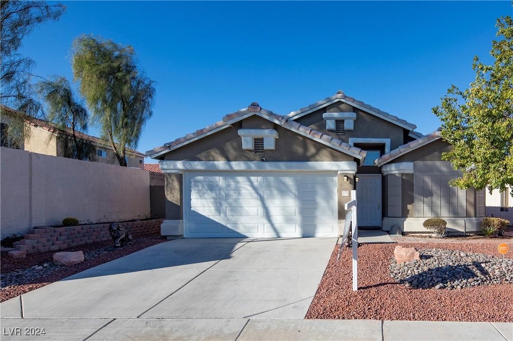 view of front of home featuring a garage