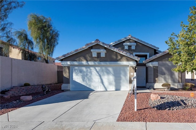 view of front of home featuring a garage