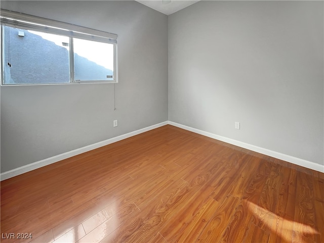 spare room featuring light wood-type flooring