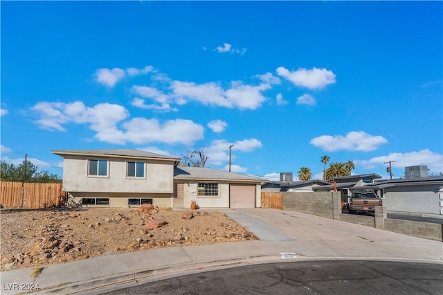 tri-level home featuring a garage