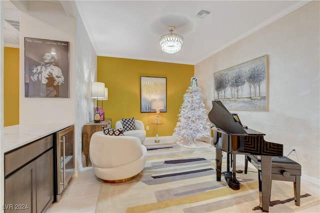 living area featuring light tile patterned flooring, crown molding, and wine cooler