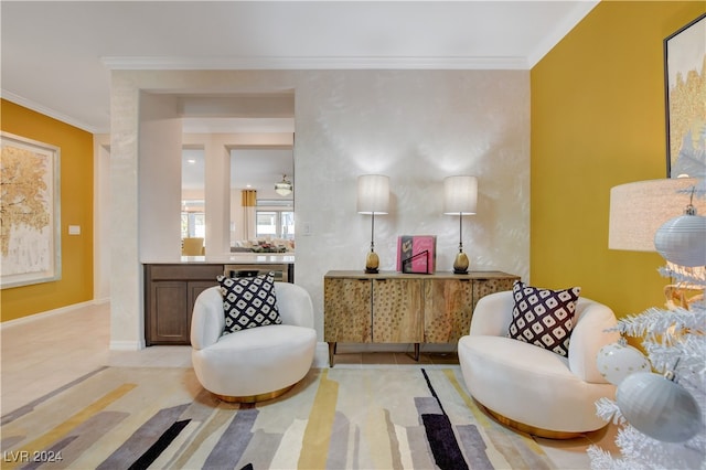 sitting room with crown molding