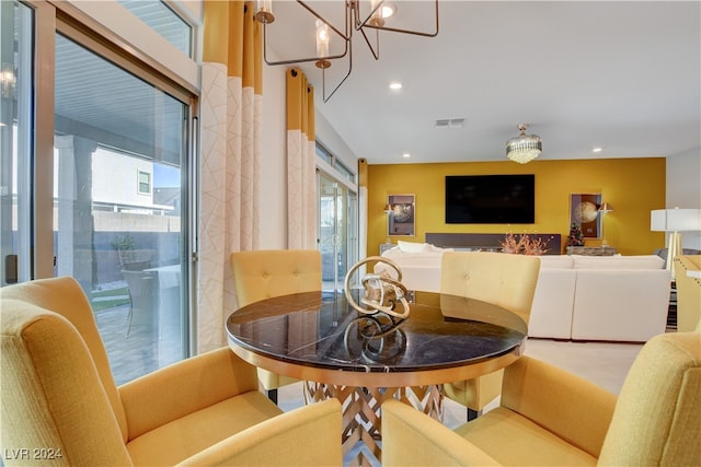 dining room with a notable chandelier