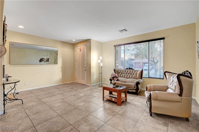 living room featuring light tile patterned flooring