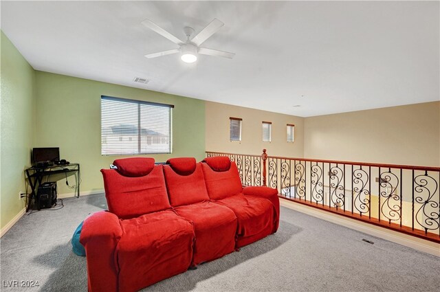 cinema featuring carpet floors and ceiling fan