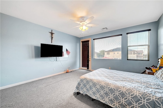 bedroom featuring ceiling fan and carpet floors