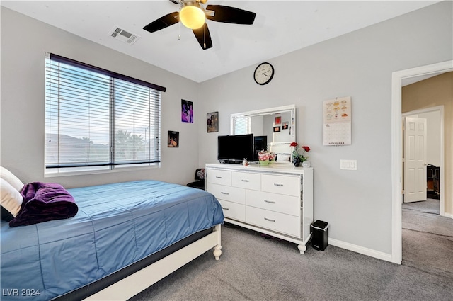 bedroom with ceiling fan and carpet