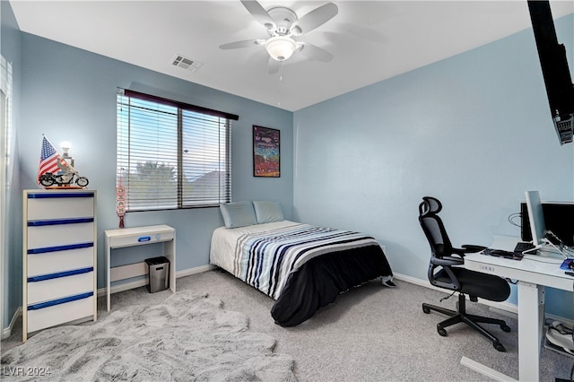 carpeted bedroom with ceiling fan