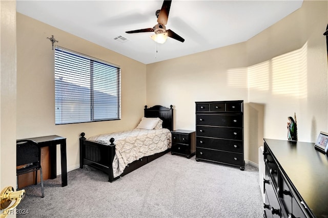 carpeted bedroom with ceiling fan