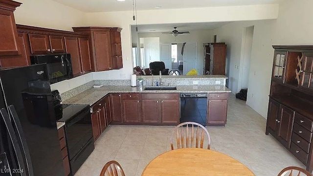 kitchen with kitchen peninsula, ceiling fan, black appliances, sink, and light tile patterned flooring