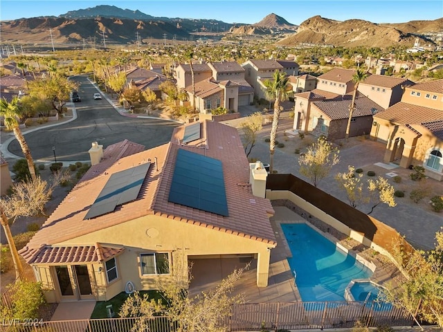 drone / aerial view featuring a mountain view