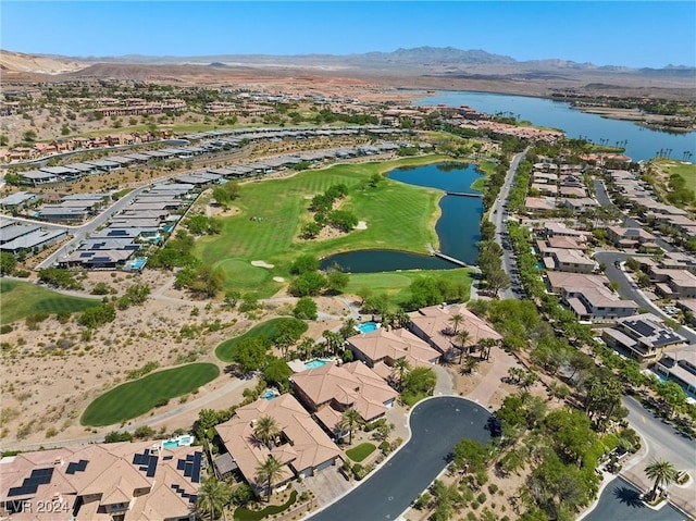 bird's eye view with a water and mountain view