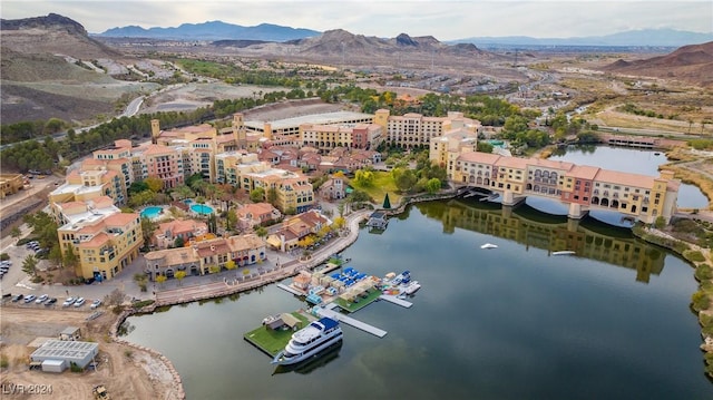 aerial view with a water and mountain view