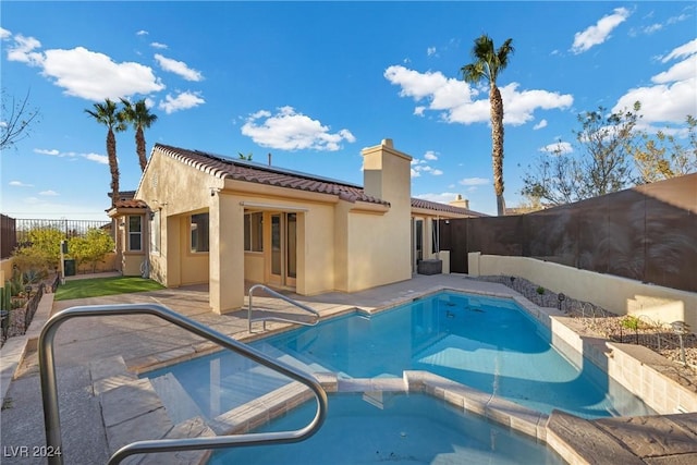 view of pool featuring a patio area